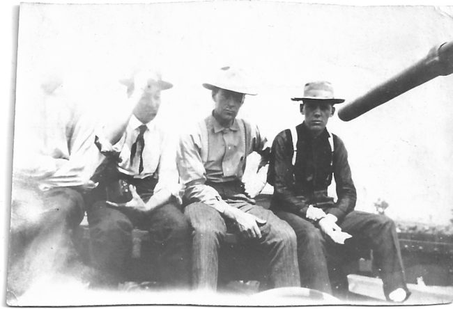 Lynn and men on handcart